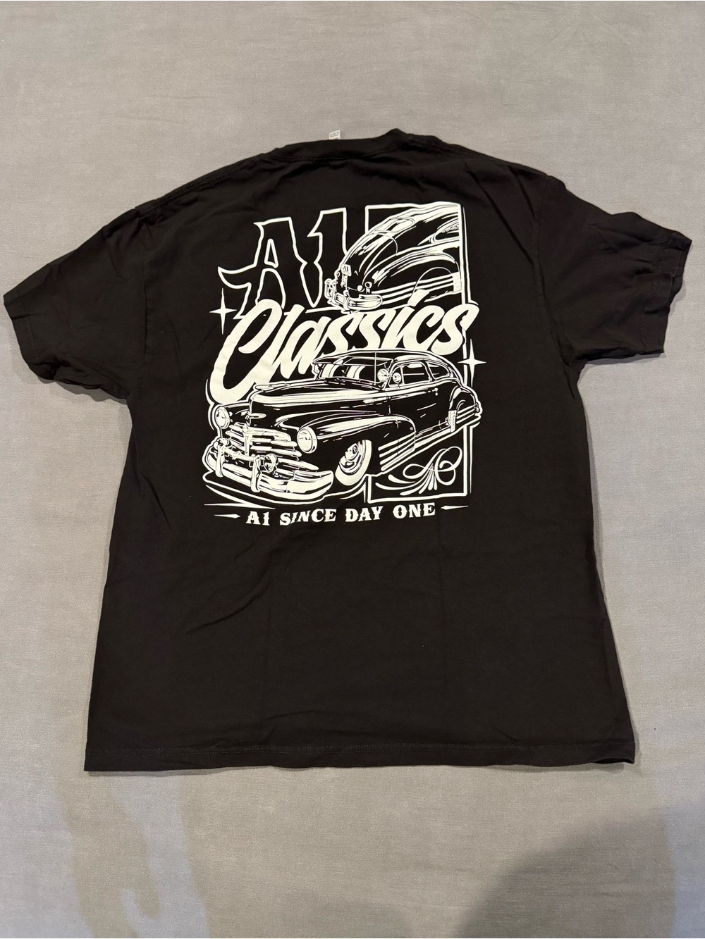 A1 Classics. Black Tee with White Chest Logo